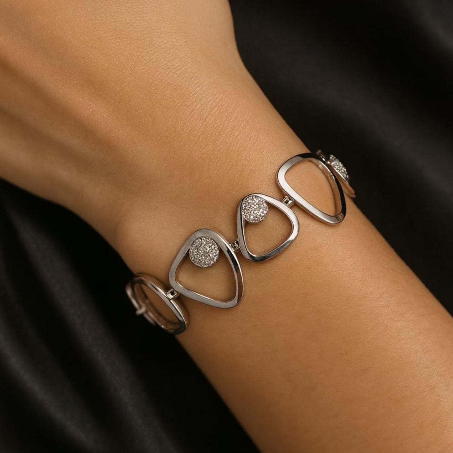 Silver Toned Ad Bracelet